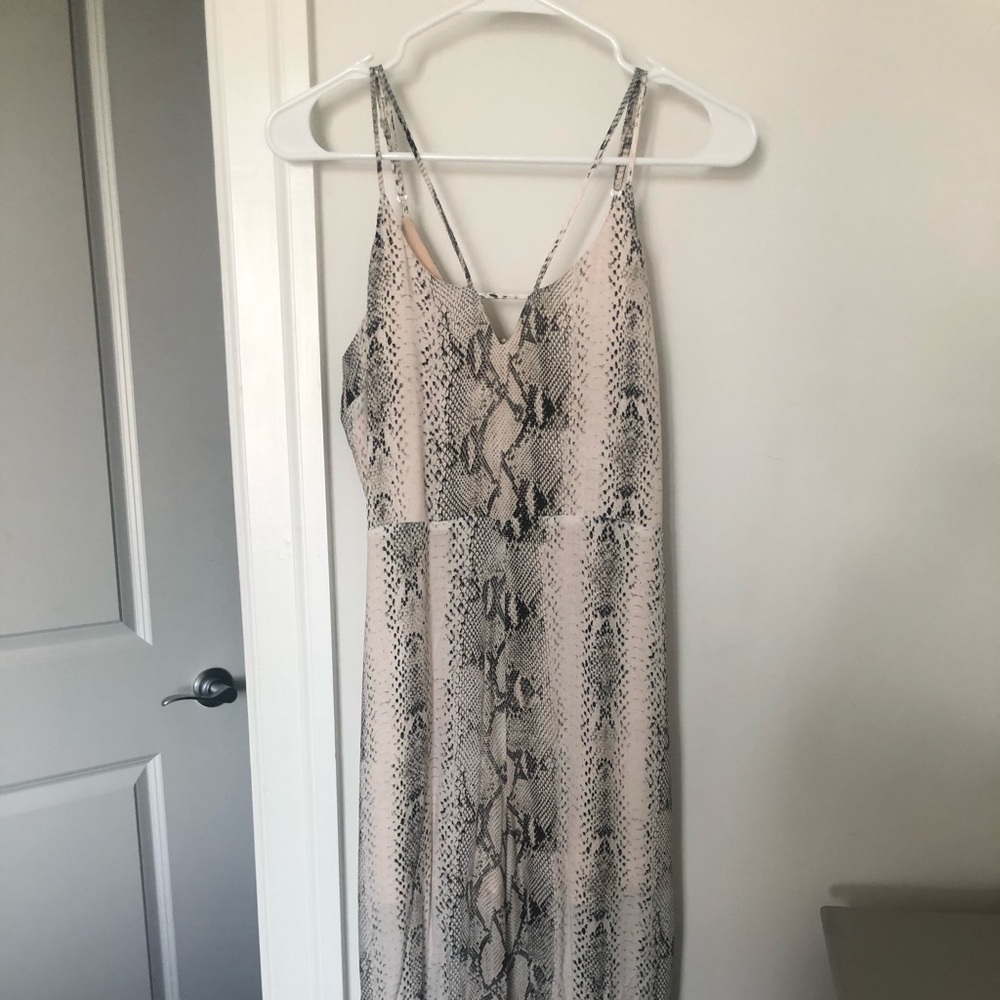 Snakeskin jumpsuit. Abbeline brand